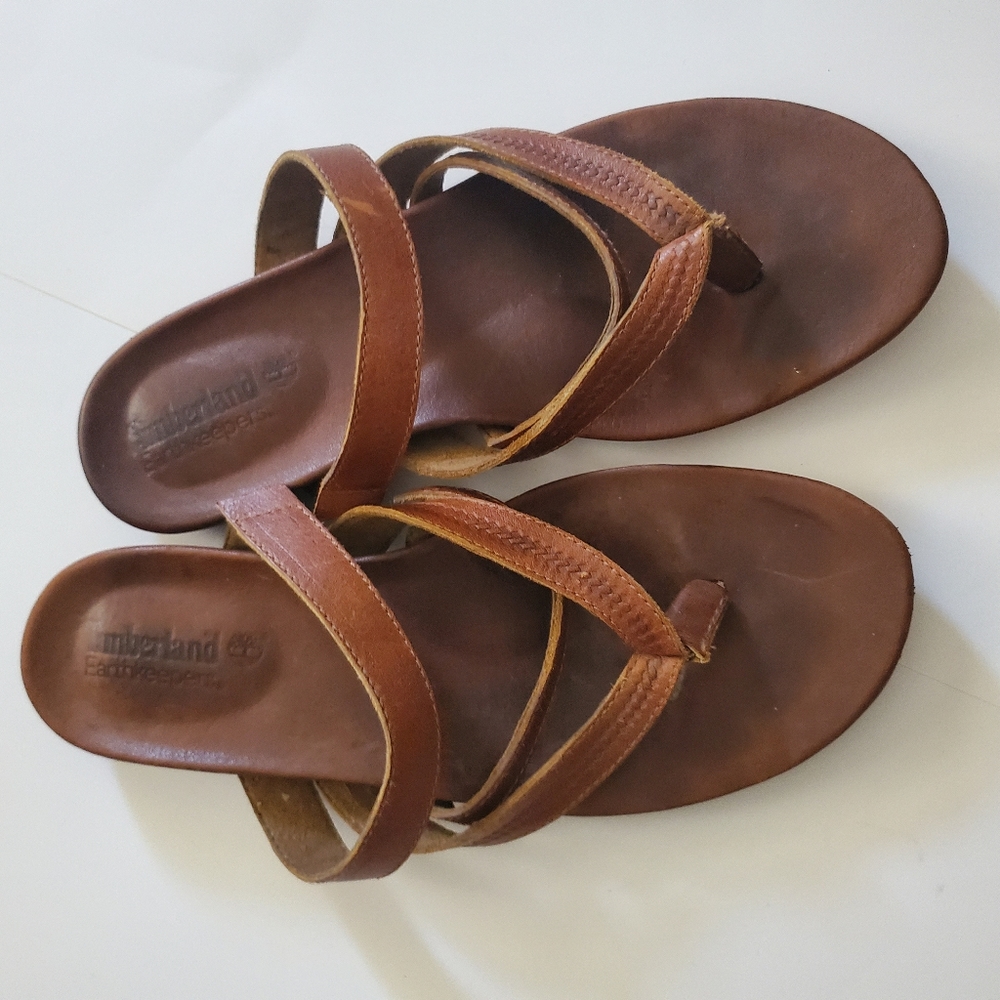 Timberland Women's Brown Leather Slide on Sandal straps.